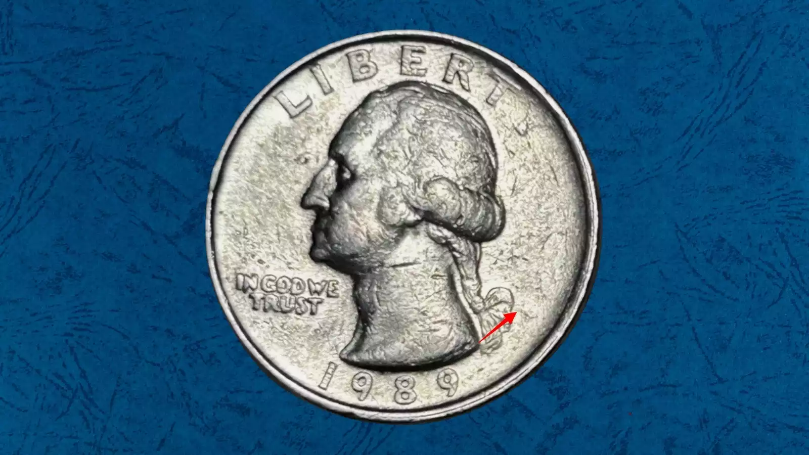 1989-P No-P filled die error quarter showing missing mintmark area under magnification